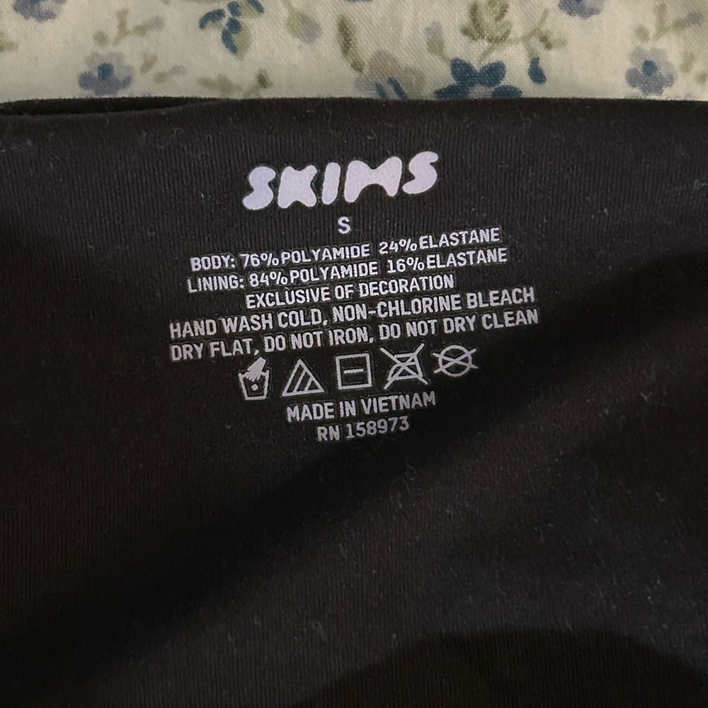 SKIMS Black tube top.
